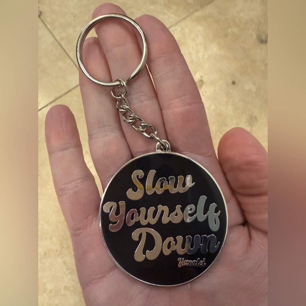 NWT Silver and Black Slow Yourself Down Keychain from Hanalei in Kauai